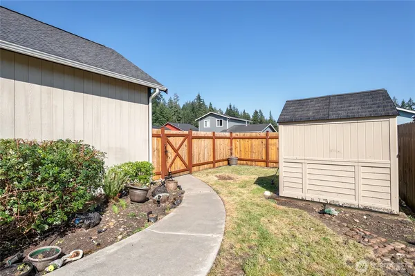 a house view with a backyard space