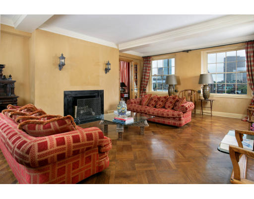 274 Beacon Street, Unit 7F Boston, MA 02116 - Photo 4 of 5 a living room with furniture and a fireplace