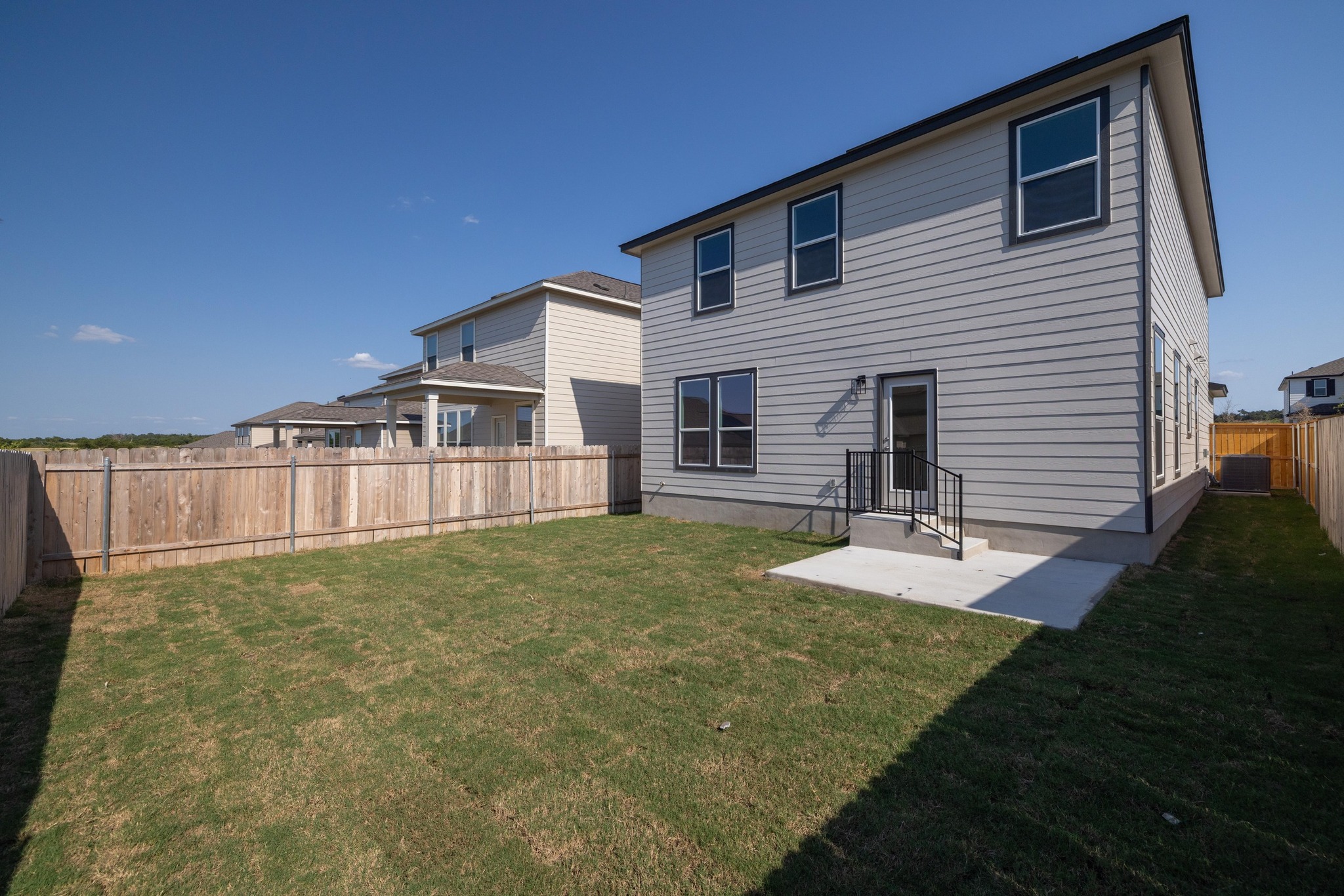 161 Lucky Texan Road Jarrell, TX 76537 - Photo 28 of 32 a view of a house with backyard and sitting area