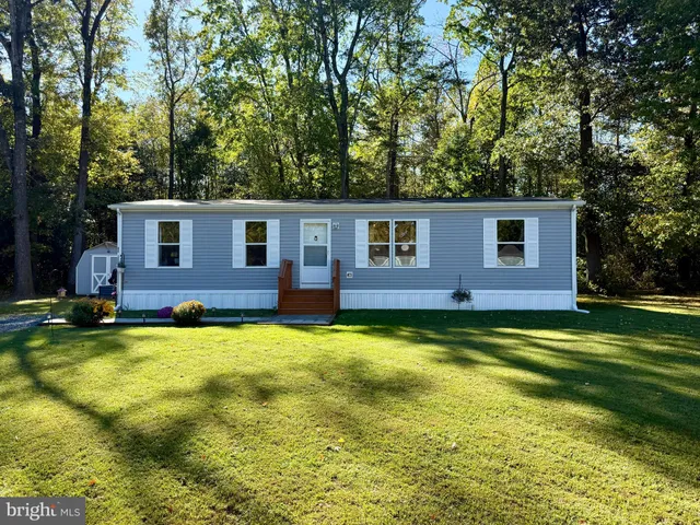 a view of a house with swimming pool