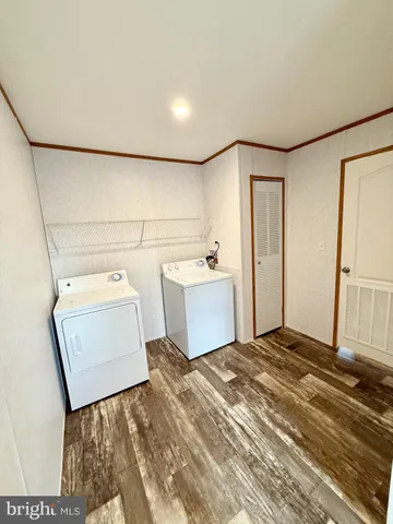 a bedroom with a bed and a sink