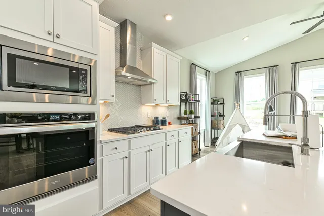 a bedroom with a bed and a cabinets