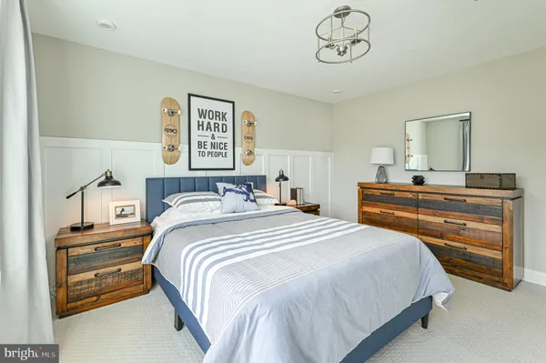 a bed room with bed and a window