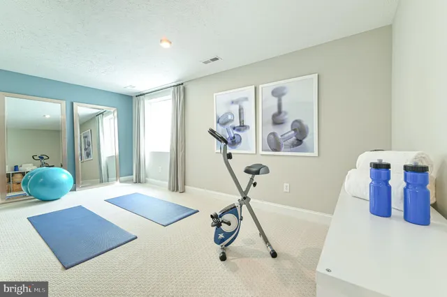 a view of front of house with a yard