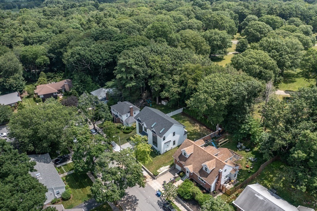 142 Bellingham Road Chestnut Hill, MA 02467 - Photo 35 of 37 an aerial view of a house with outdoor space and street view