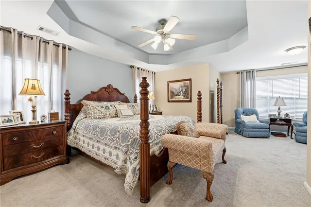 a bedroom with a bed and furniture