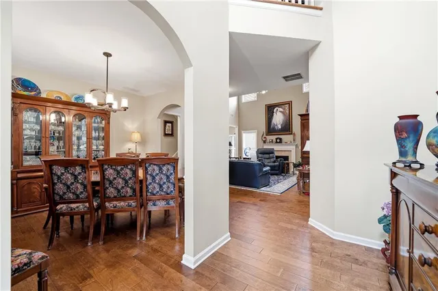 a view of a dining room with furniture and a livingroom