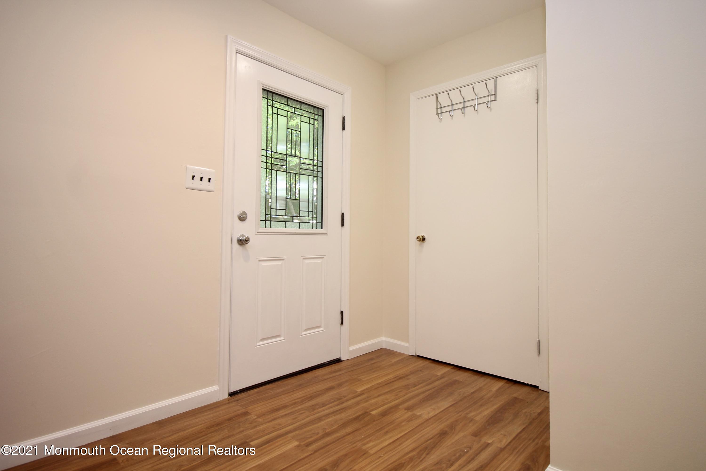 152 Cours De Pasteur, Unit E Freehold, NJ 07728 - Photo 2 of 21 a view of a room that has a window in it