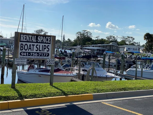 a view of a park with sitting area
