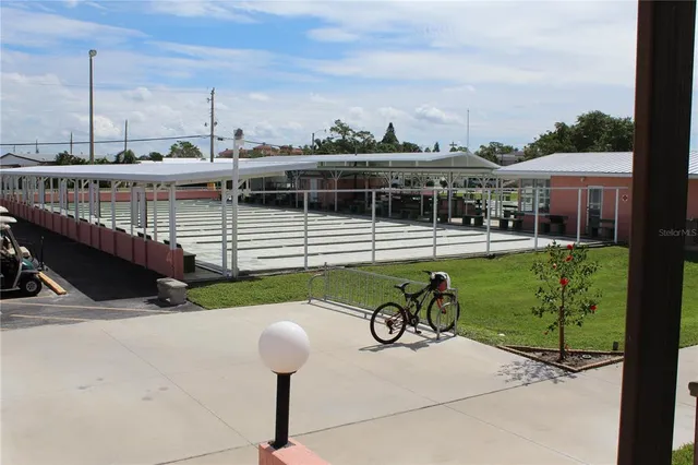 a view of a terrace with chairs