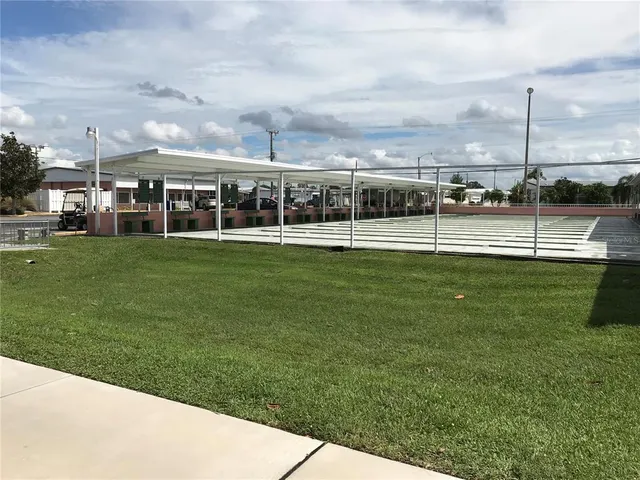 a view of building with yard