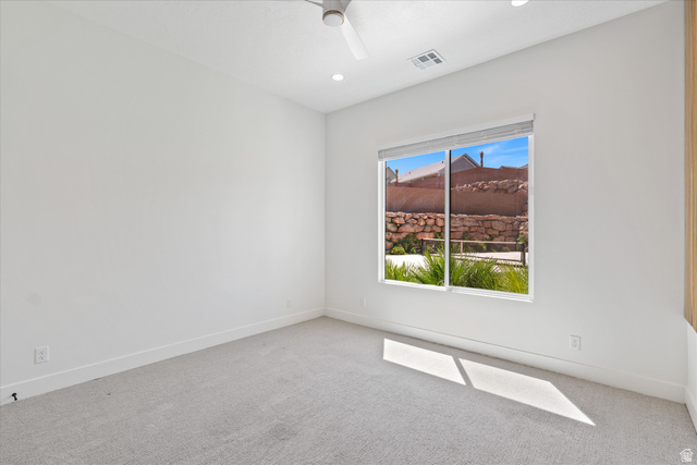 1192 East Corral Way Washington, UT 84780 - Photo 38 of 81 Carpeted room with a large window, recessed lighting, and a ceiling fan