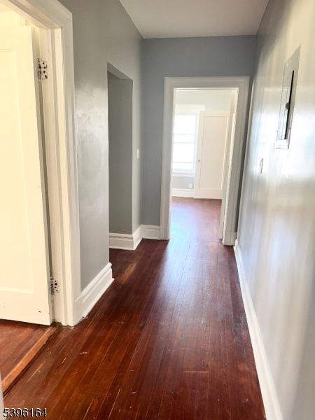 42 Clinton Place, Unit 2 Newark, NJ 07108 - Photo 11 of 20 a view of a hallway with wooden floor