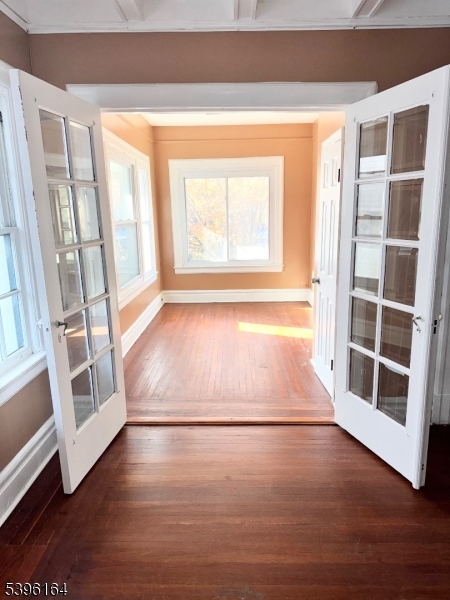 42 Clinton Place, Unit 2 Newark, NJ 07108 - Photo 18 of 20 a view of a room with wooden floor and window