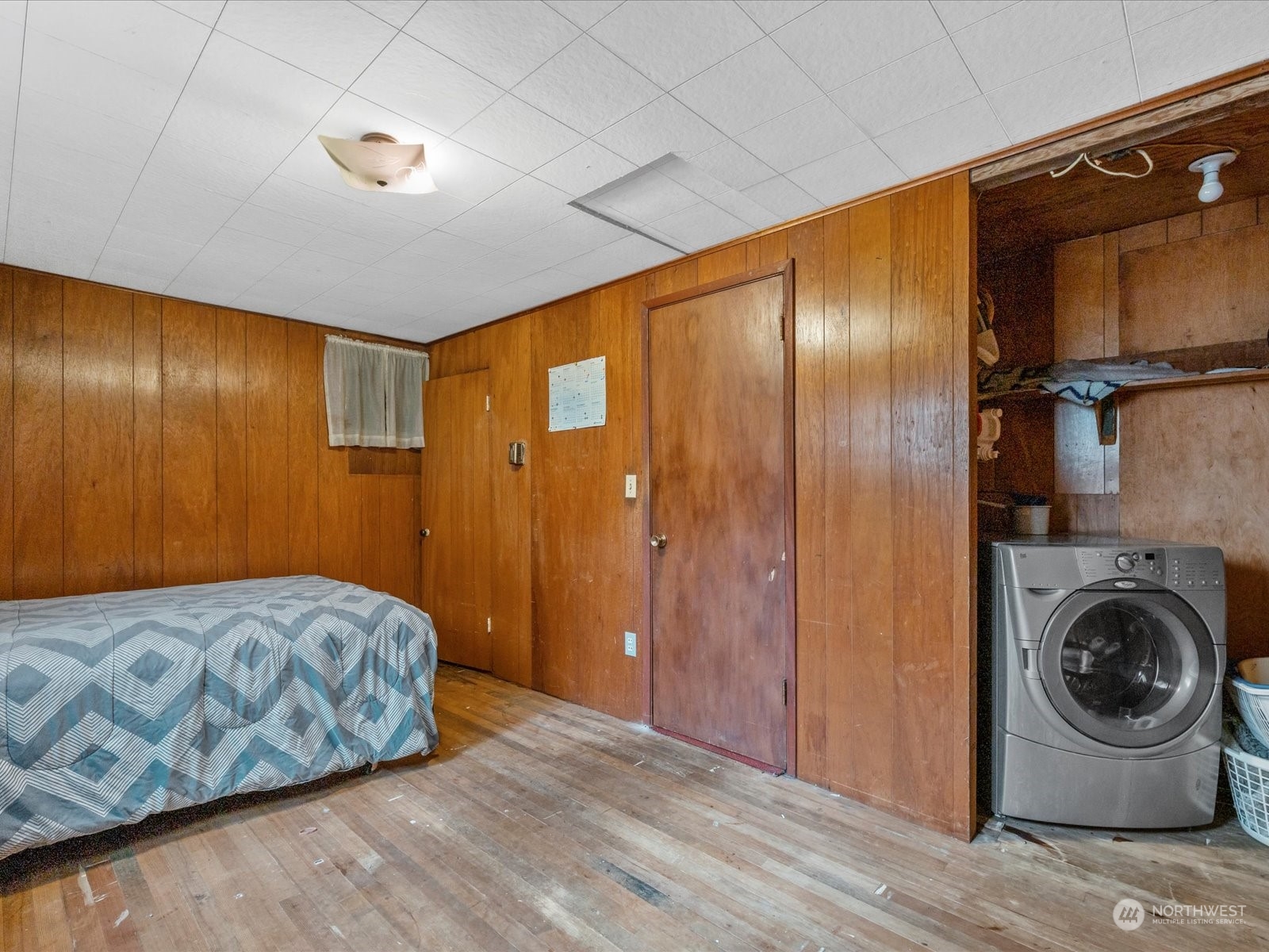 8832 Interlake Avenue North Seattle, WA 98103 - Photo 14 of 29 a view of a livingroom with washer and dryer