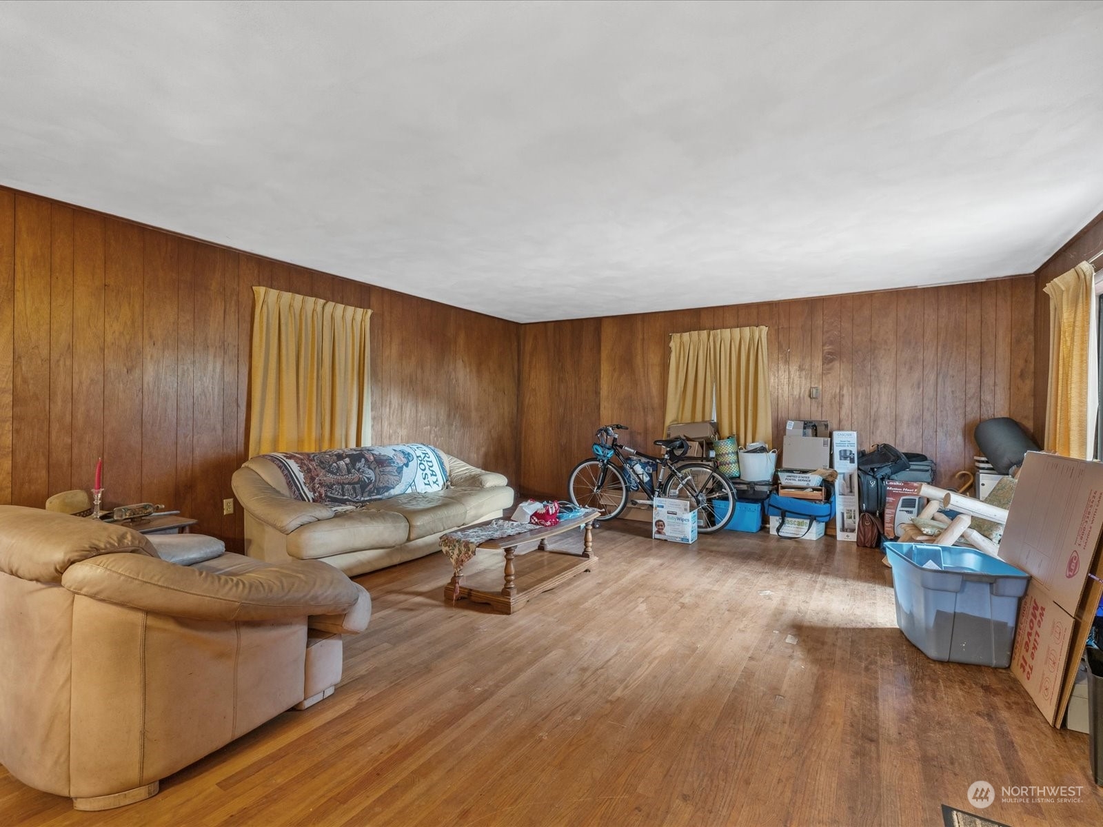 8832 Interlake Avenue North Seattle, WA 98103 - Photo 2 of 29 a living room with furniture and a flat screen tv