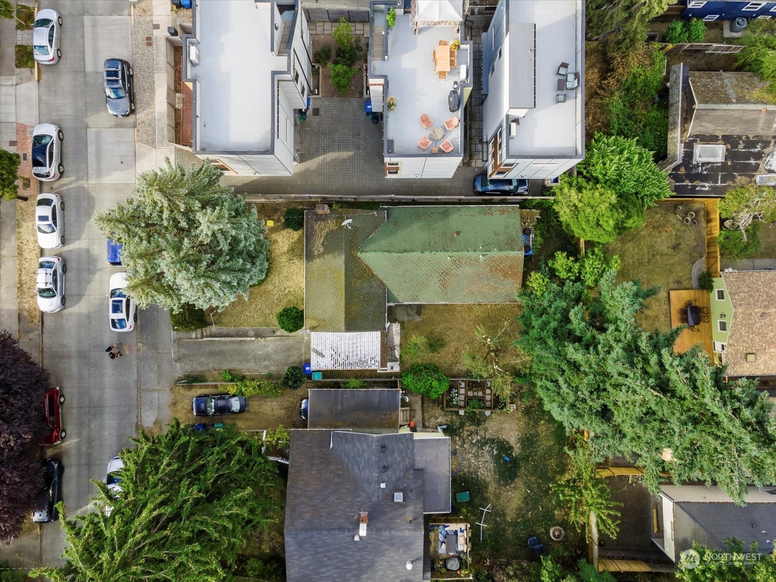 8832 Interlake Avenue North Seattle, WA 98103 - Photo 24 of 29 an aerial view of a house with a garden and yard