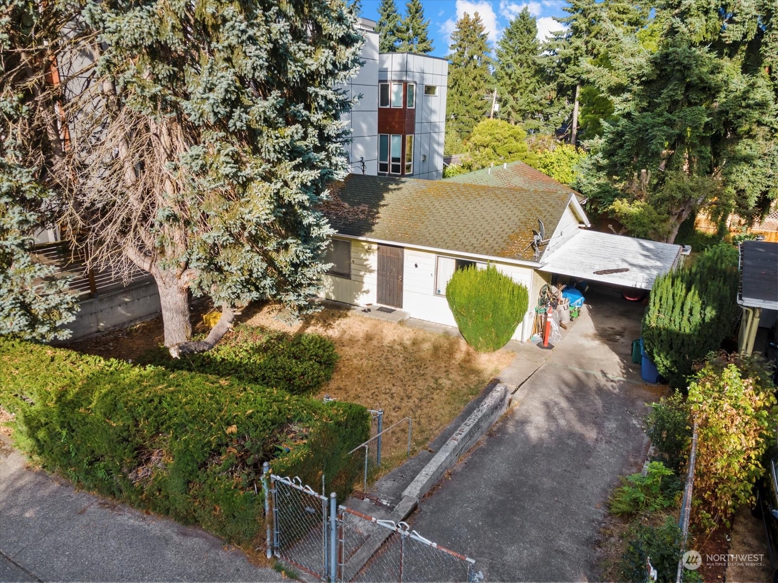 8832 Interlake Avenue North Seattle, WA 98103 - Photo 28 of 29 an aerial view of a house with outdoor space