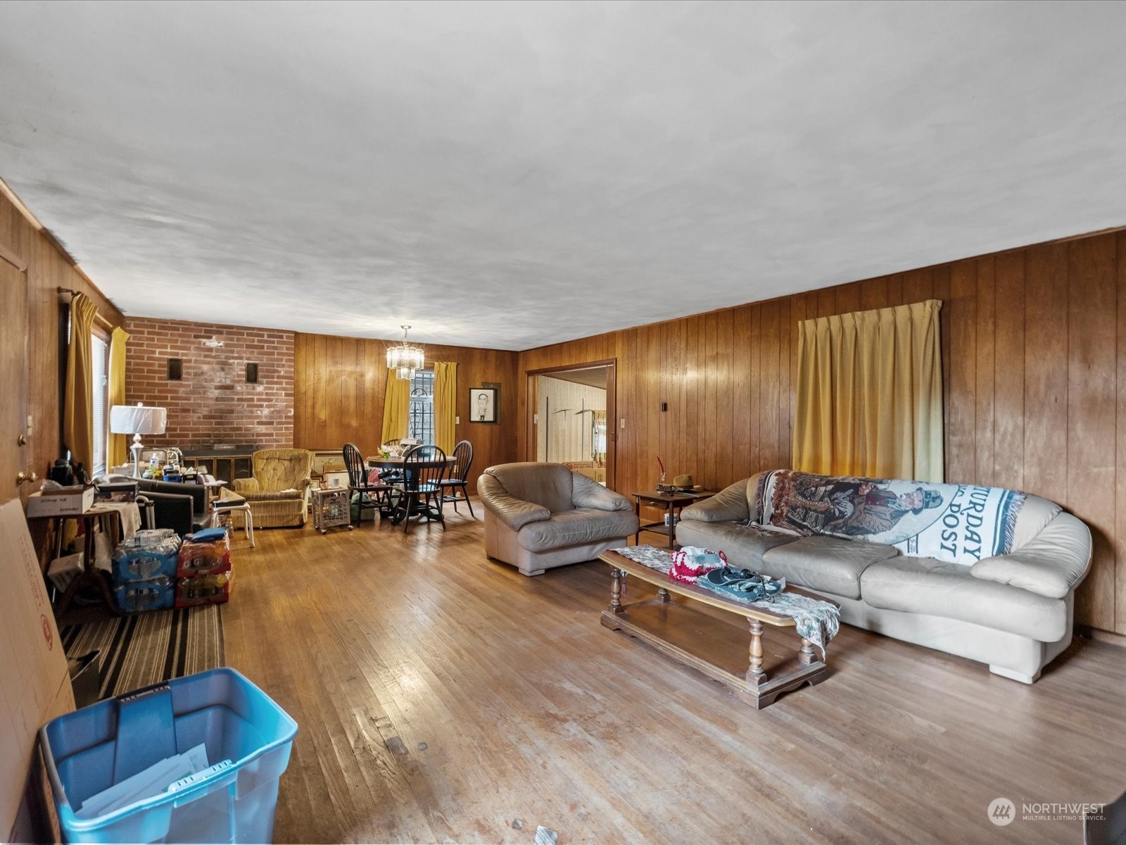 8832 Interlake Avenue North Seattle, WA 98103 - Photo 3 of 29 a living room with furniture and a large window
