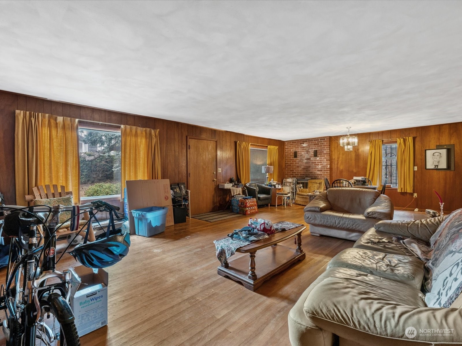 8832 Interlake Avenue North Seattle, WA 98103 - Photo 4 of 29 a living room with furniture and a large window