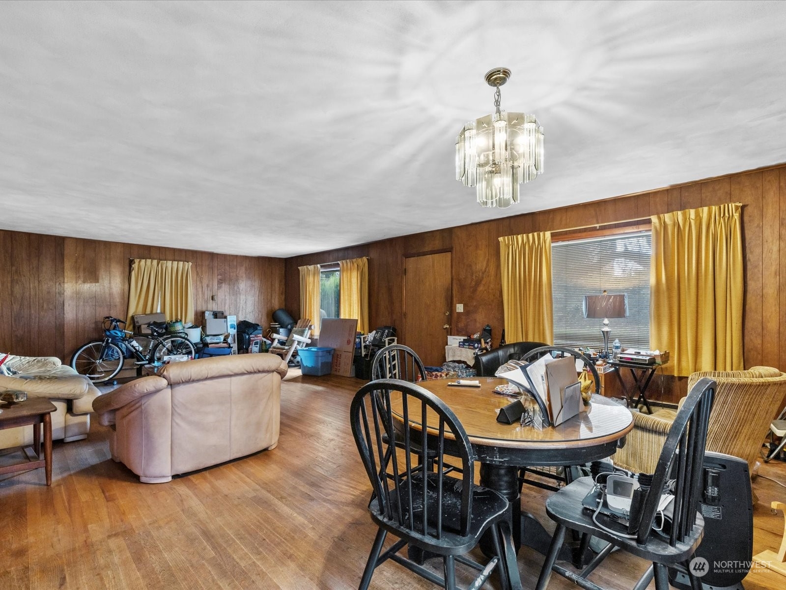 8832 Interlake Avenue North Seattle, WA 98103 - Photo 5 of 29 a view of a dining room with furniture window and outside view