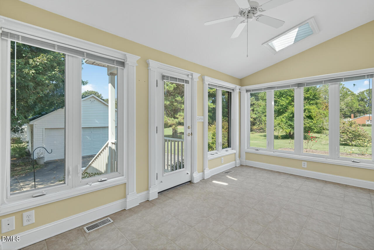720 Roxboro Road Haw River, NC 27258 - Photo 10 of 55 a view of an empty room with a window