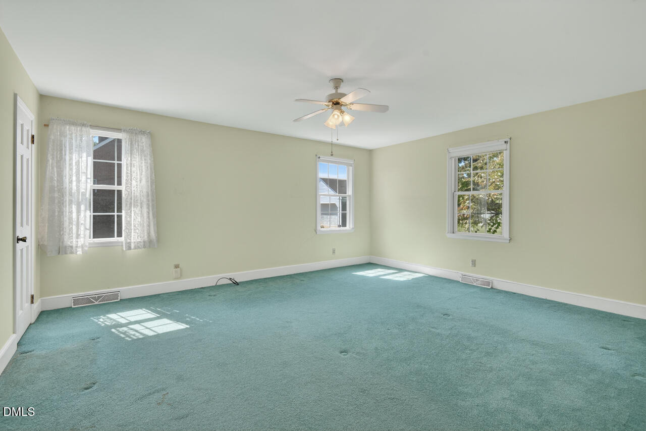 720 Roxboro Road Haw River, NC 27258 - Photo 22 of 55 wooden floor in an empty room with a window