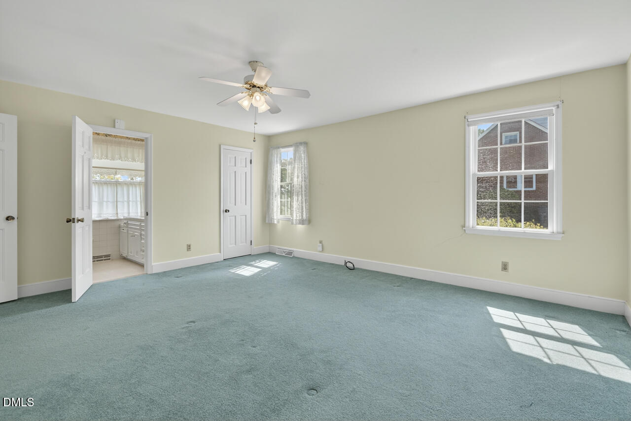 720 Roxboro Road Haw River, NC 27258 - Photo 23 of 55 a view of an empty room with a window