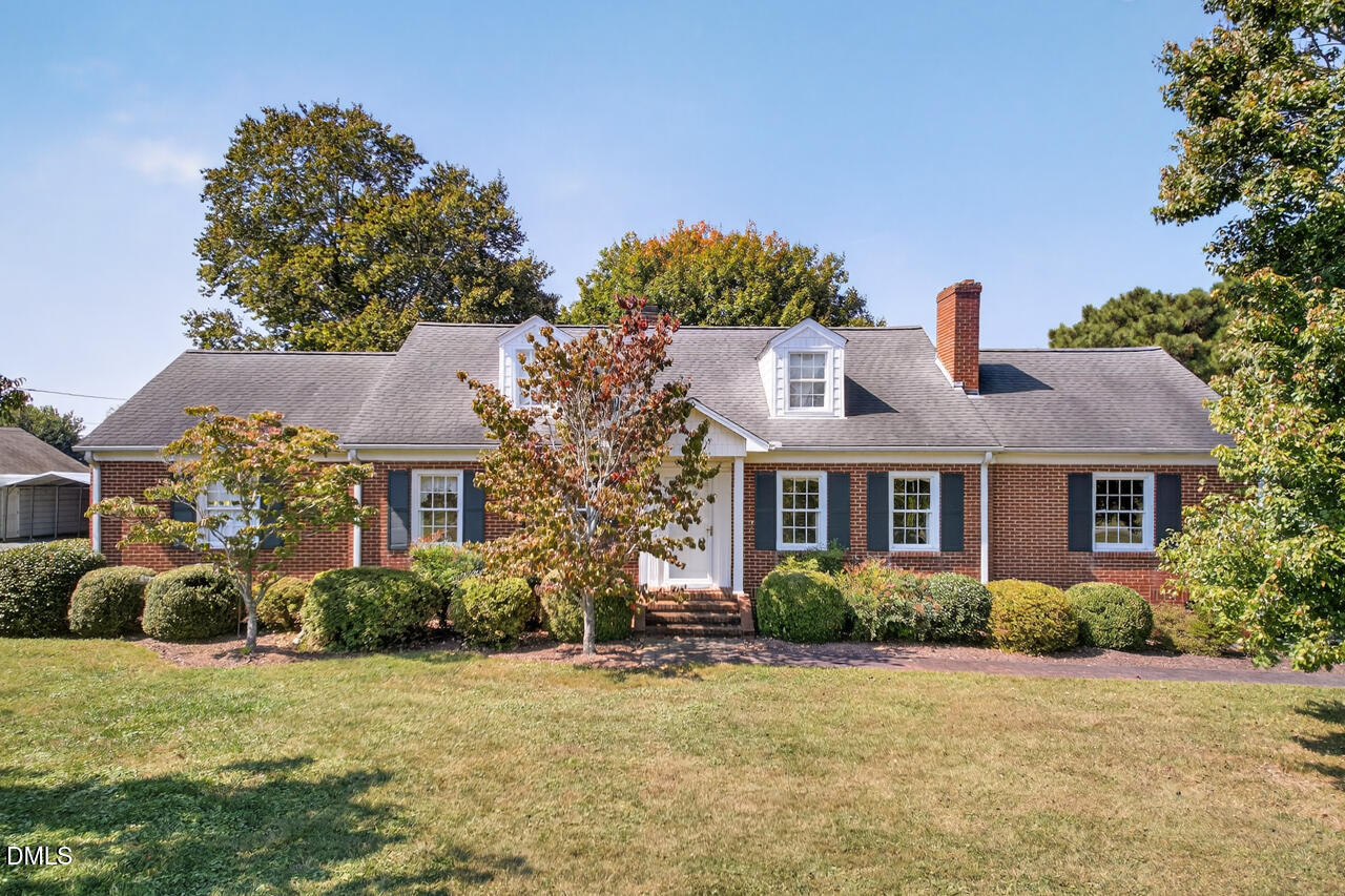 720 Roxboro Road Haw River, NC 27258 - Photo 2 of 55 front view of a house with a yard