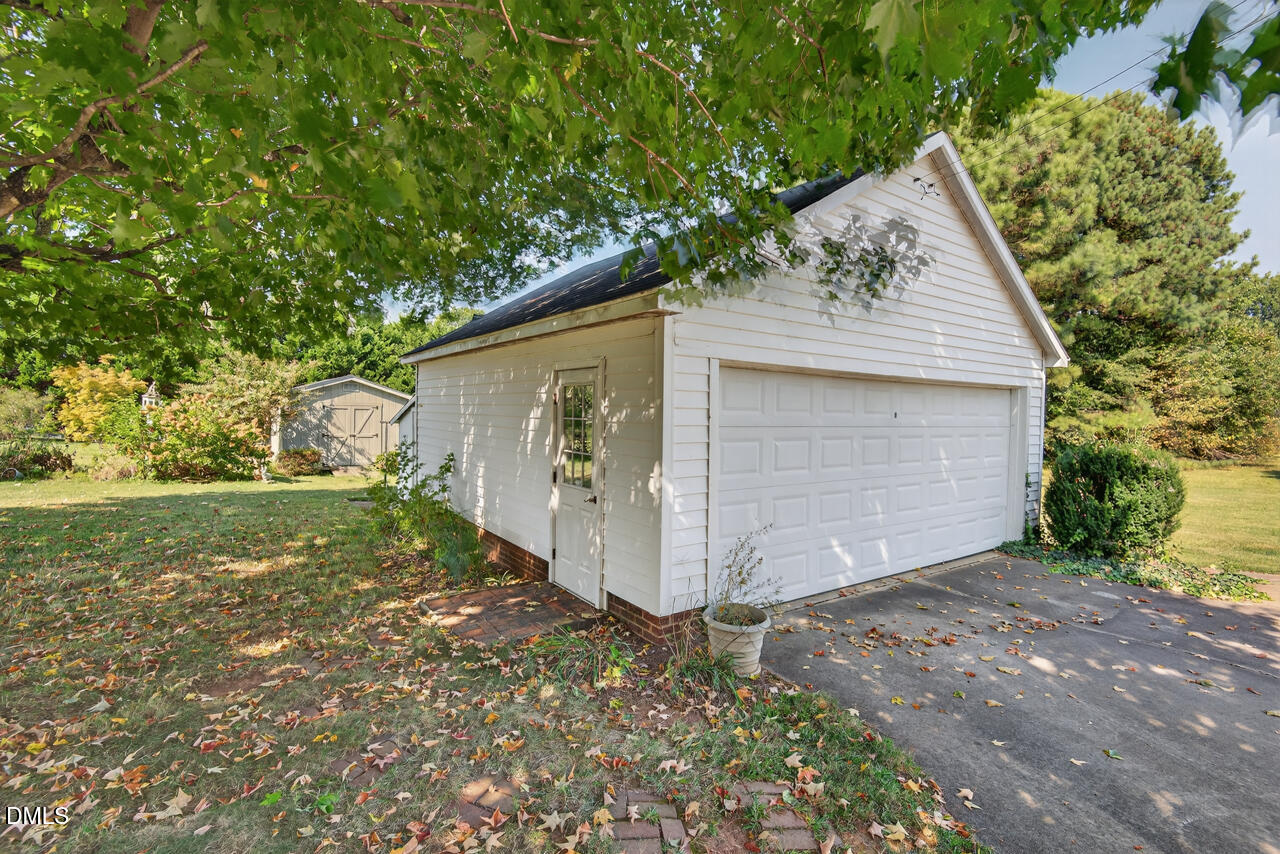 720 Roxboro Road Haw River, NC 27258 - Photo 36 of 55 a view of a house with a yard