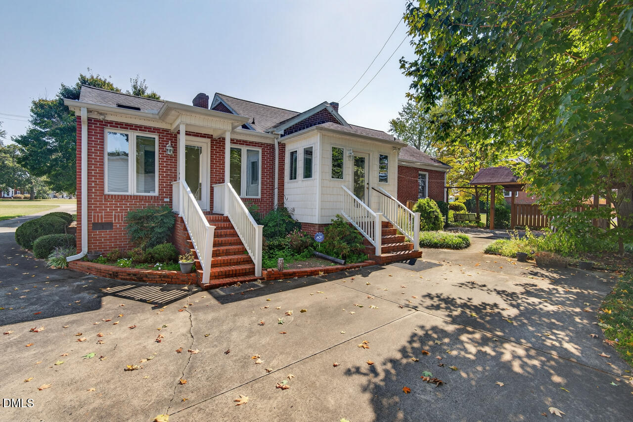 720 Roxboro Road Haw River, NC 27258 - Photo 40 of 55 a front view of a house with garden