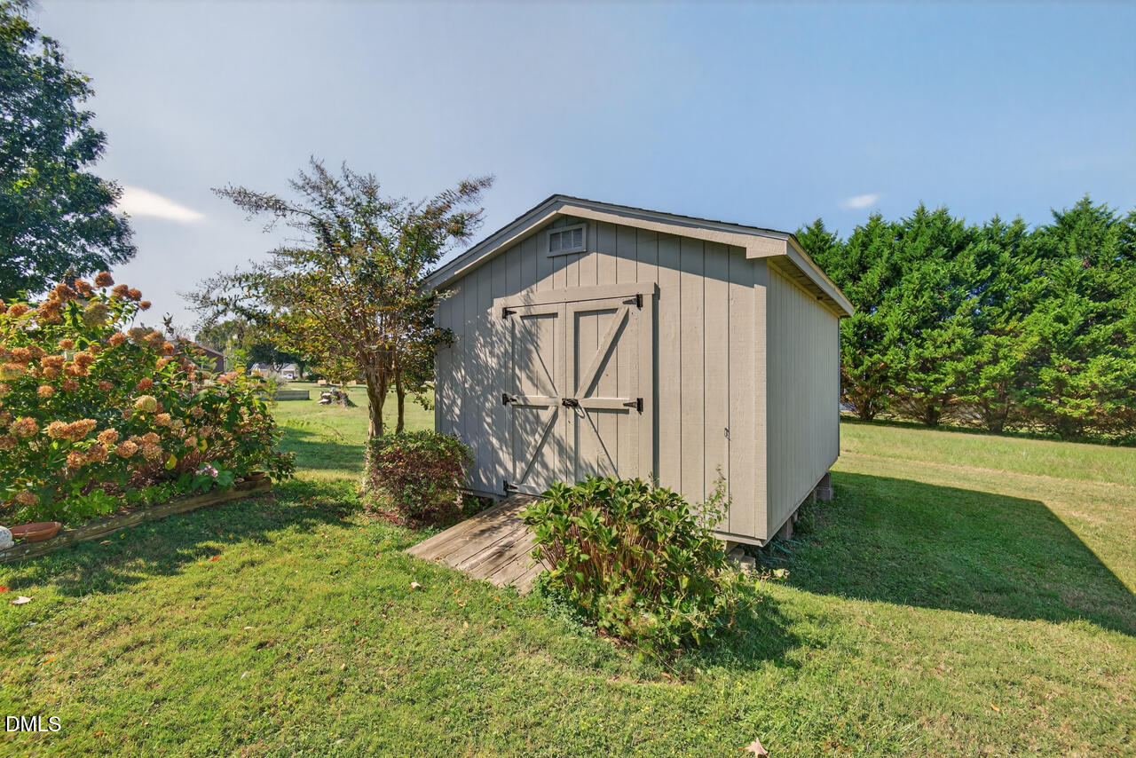 720 Roxboro Road Haw River, NC 27258 - Photo 44 of 55 a view of a backyard of the house