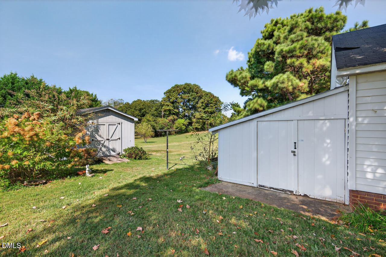 720 Roxboro Road Haw River, NC 27258 - Photo 47 of 55 a backyard of a house with lots of green space