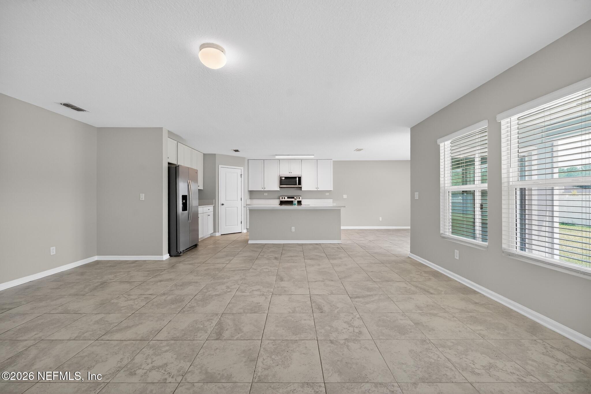 4818 Morning Rise Circle Jacksonville, FL 32218 - Photo 5 of 33 04_4818_Morning_Rise_Cir-Living_room-847