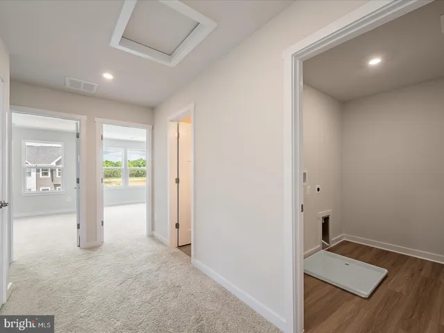 a view of room with a flat screen tv