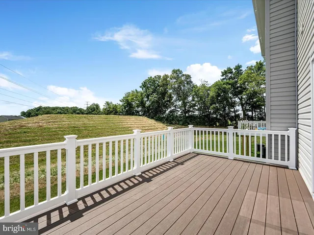 a view of a wooden roof deck
