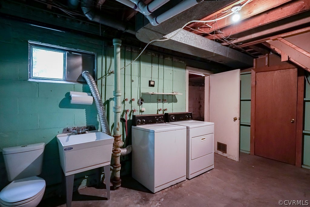 8531 Trabue Road North Chesterfield, VA 23235 - Photo 32 of 42 Laundry room provides handy extra half bath