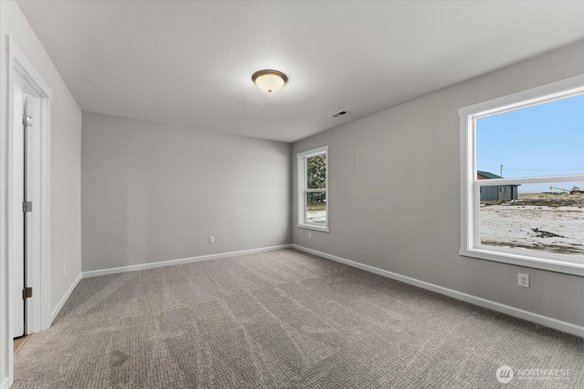 34 Simpson Street Mansfield, WA 98830 - Photo 15 of 29 a view of an empty room with a window