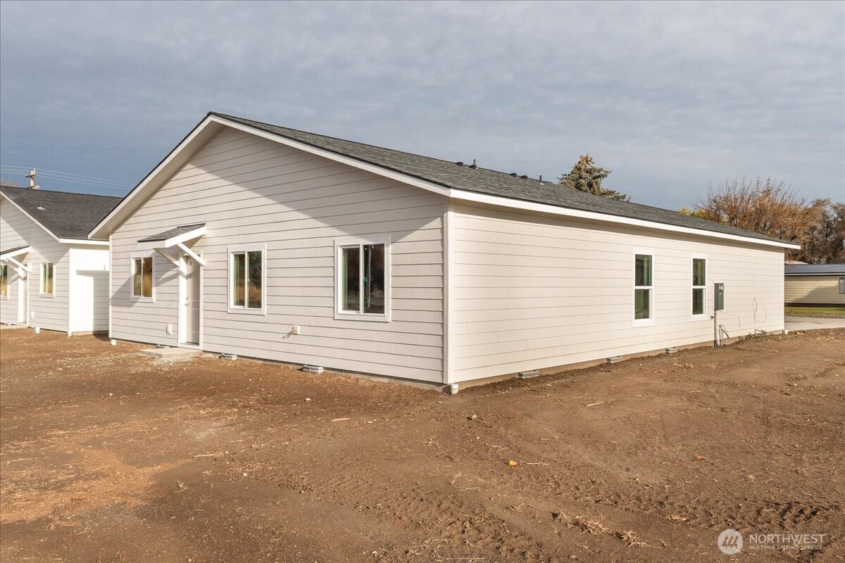 34 Simpson Street Mansfield, WA 98830 - Photo 24 of 29 a view of a house with garage