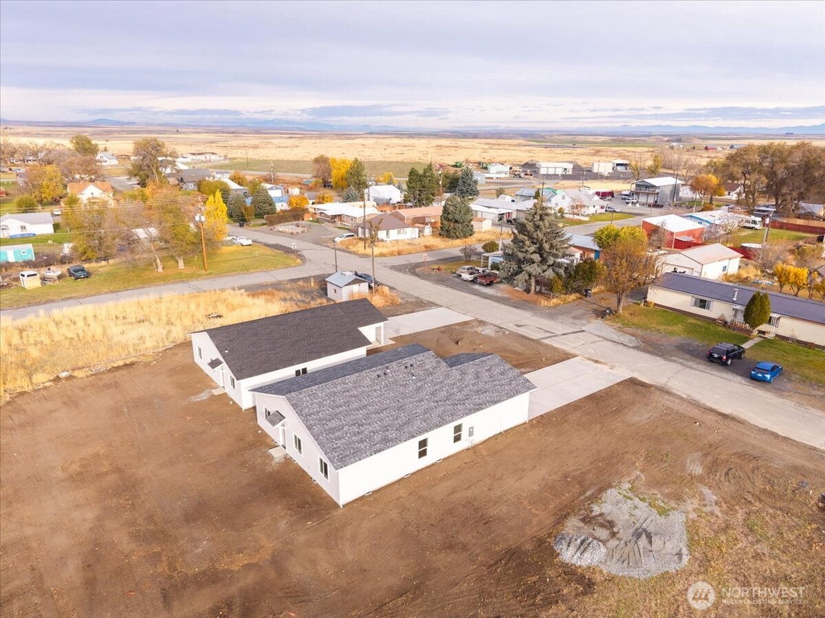 34 Simpson Street Mansfield, WA 98830 - Photo 28 of 29 an aerial view of residential houses with outdoor space