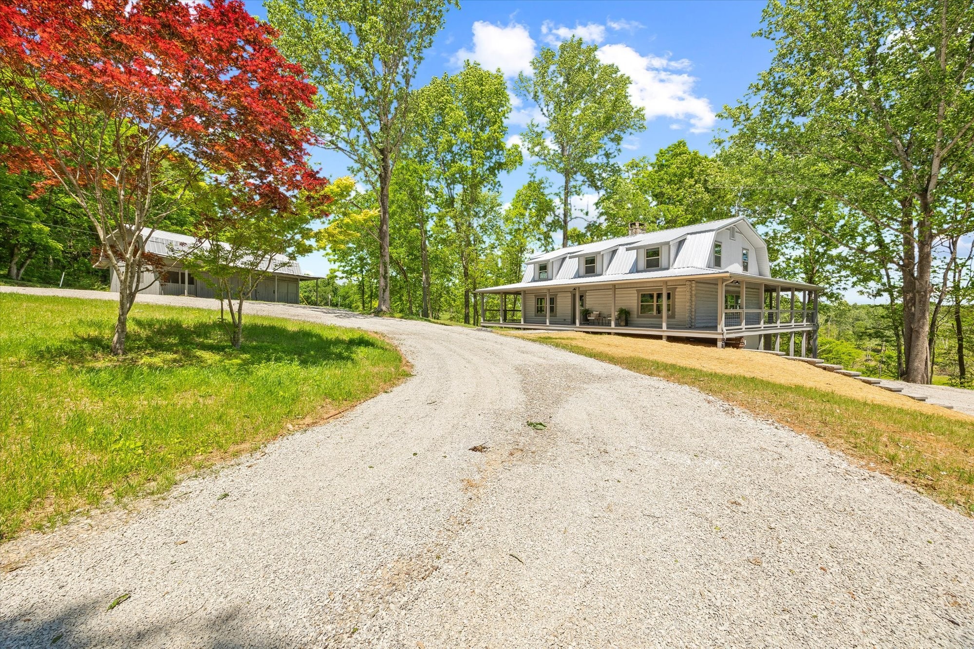 a view of a swimming pool with a garden