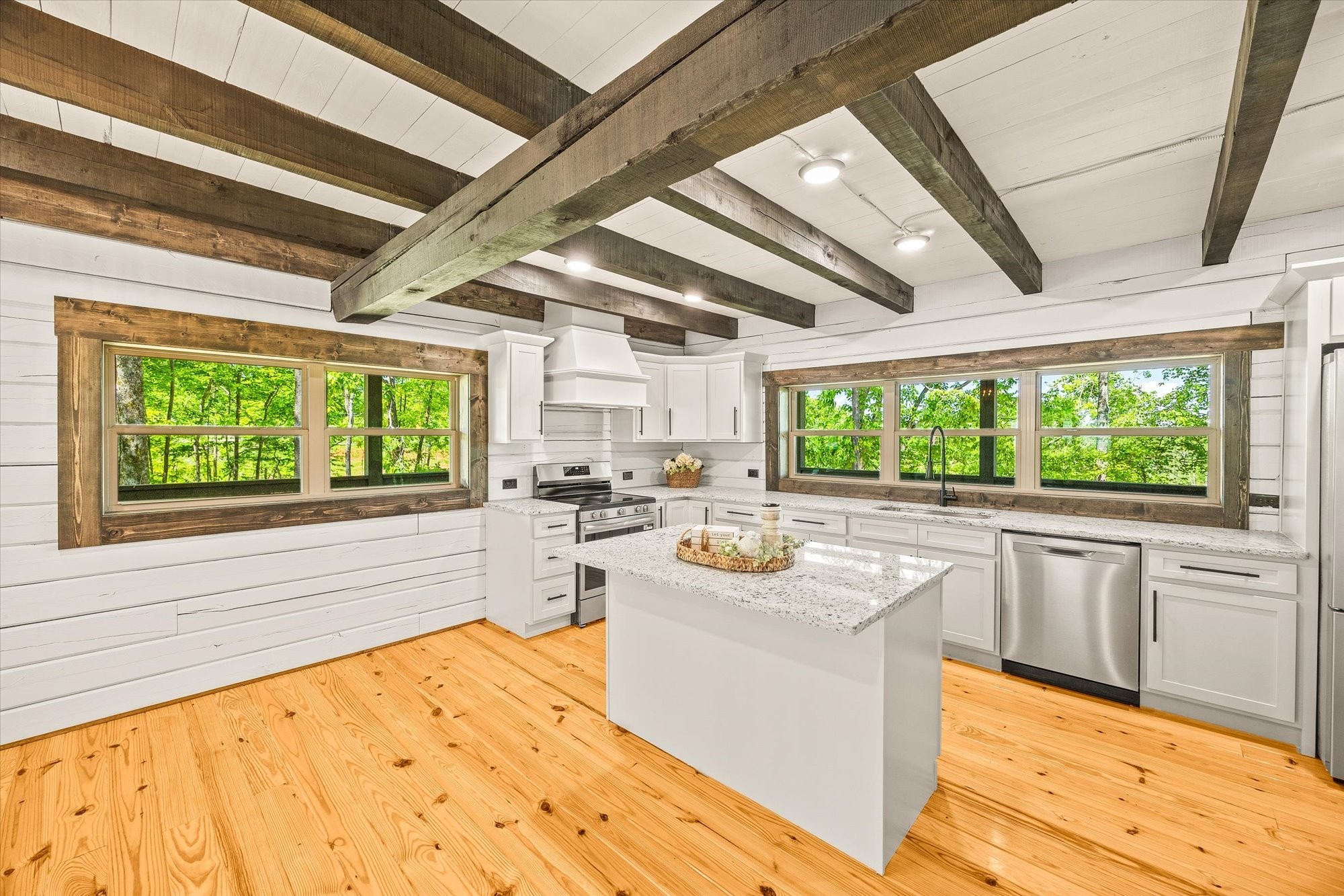 4221 New Hope Road Celina, TN 38551 - Photo 21 of 52 a kitchen with a sink stove and cabinets
