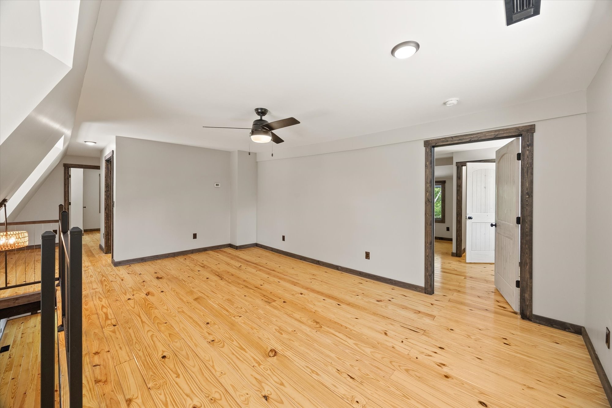 4221 New Hope Road Celina, TN 38551 - Photo 27 of 52 a view of a room with wooden floor and cabinet