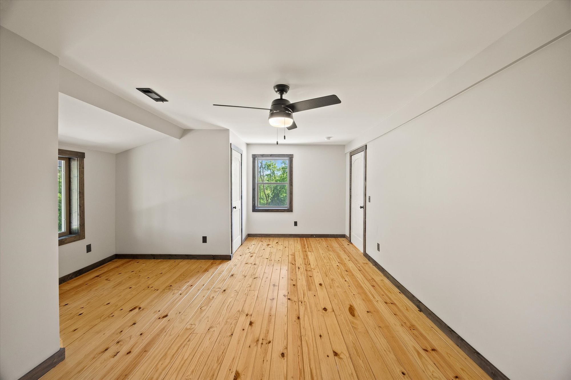4221 New Hope Road Celina, TN 38551 - Photo 31 of 52 wooden floor in an empty room with a window