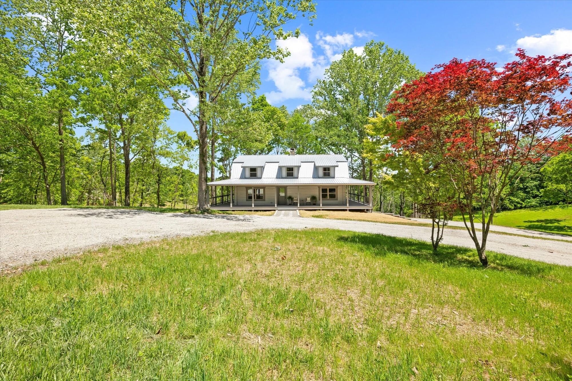 4221 New Hope Road Celina, TN 38551 - Photo 4 of 52 a view of an house with swimming pool and a yard