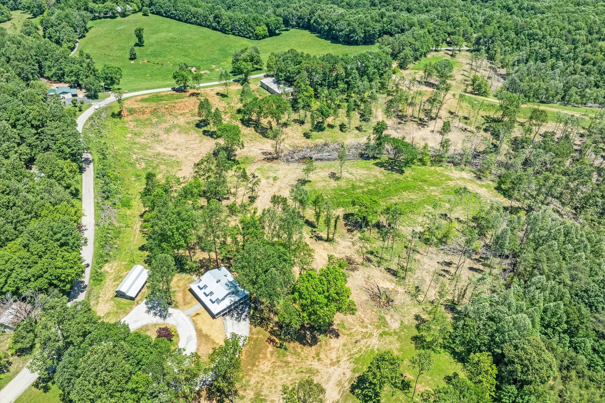 4221 New Hope Road Celina, TN 38551 - Photo 44 of 52 an aerial view of residential houses with outdoor space and trees