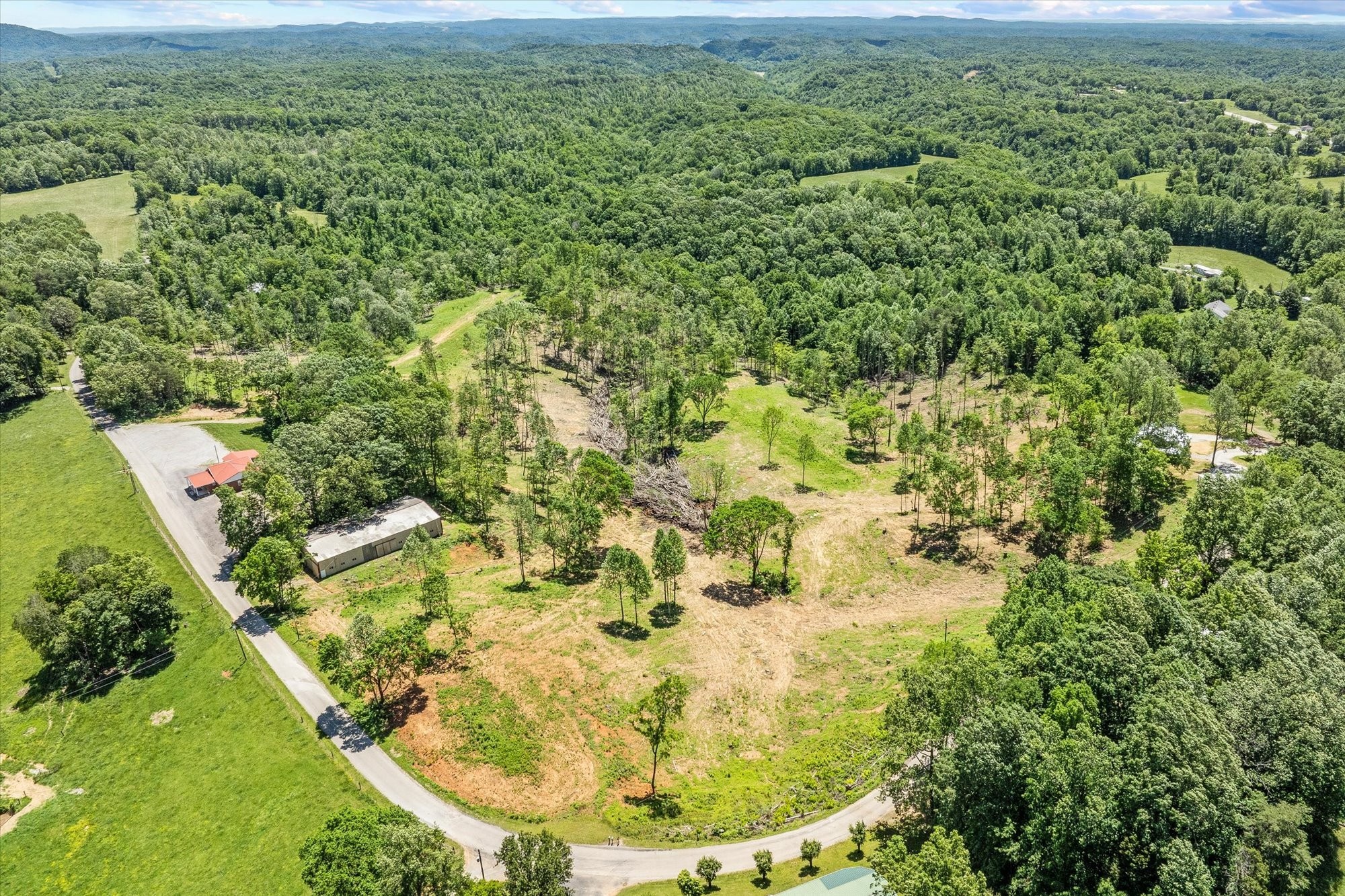 4221 New Hope Road Celina, TN 38551 - Photo 45 of 52 a view of a lake with a mountain