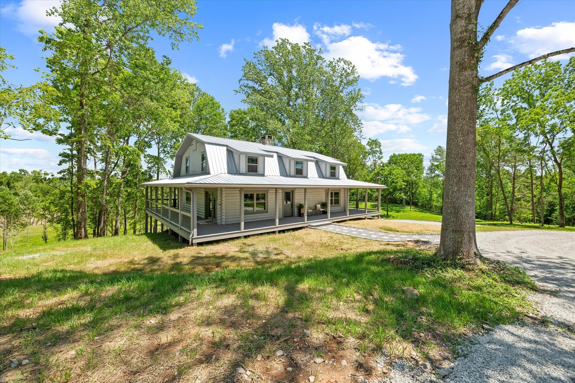 4221 New Hope Road Celina, TN 38551 - Photo 5 of 52 a house with trees in the background