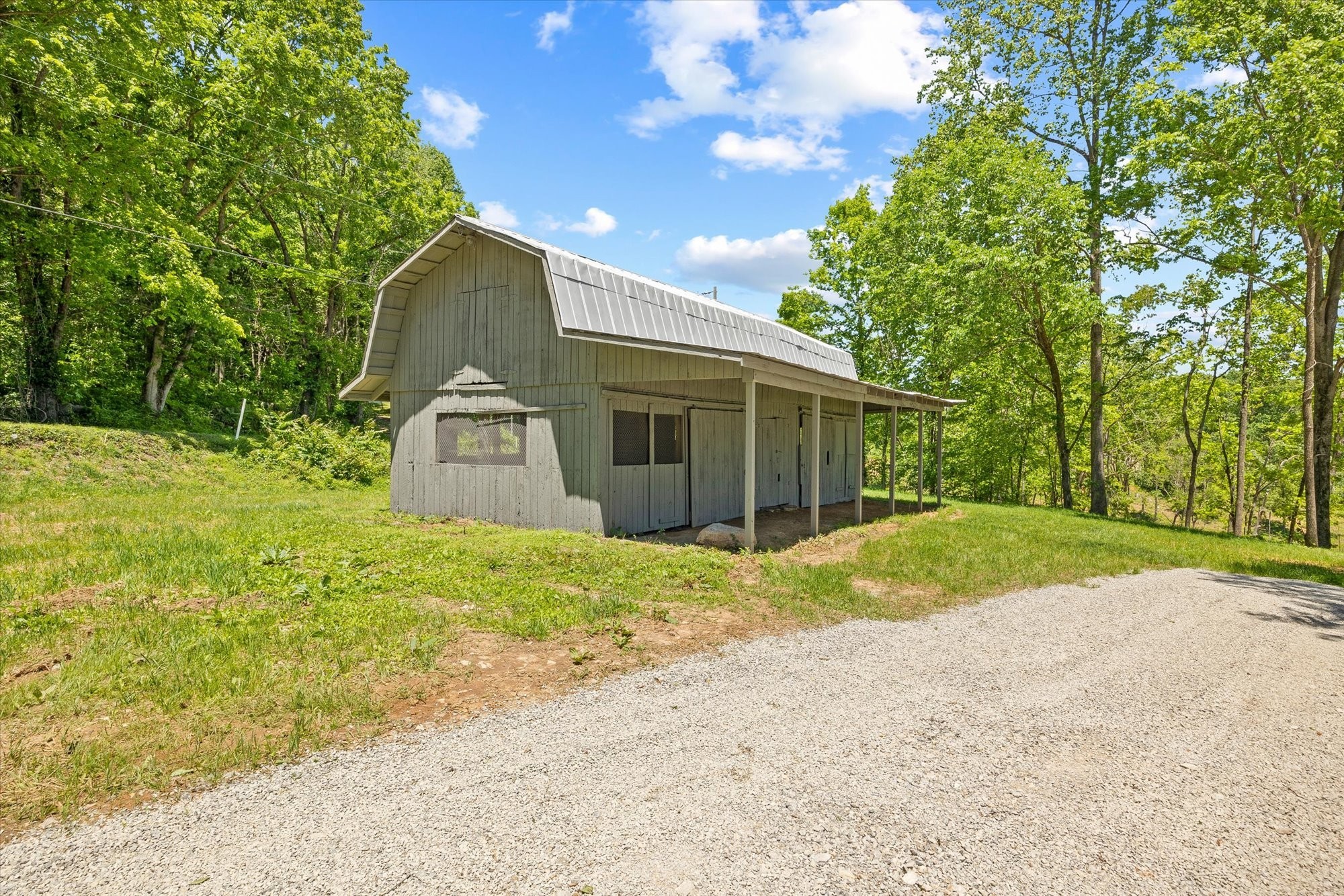 4221 New Hope Road Celina, TN 38551 - Photo 10 of 52 a house with a yard