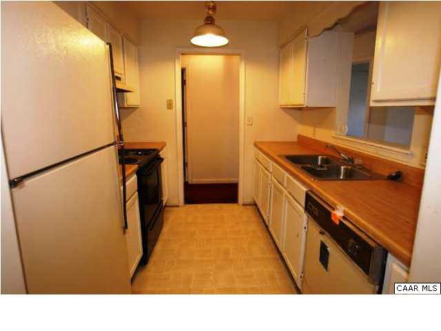 372 Minor Ridge Road Charlottesville, VA 22901 - Photo 7 of 15 a kitchen with sink refrigerator and stove